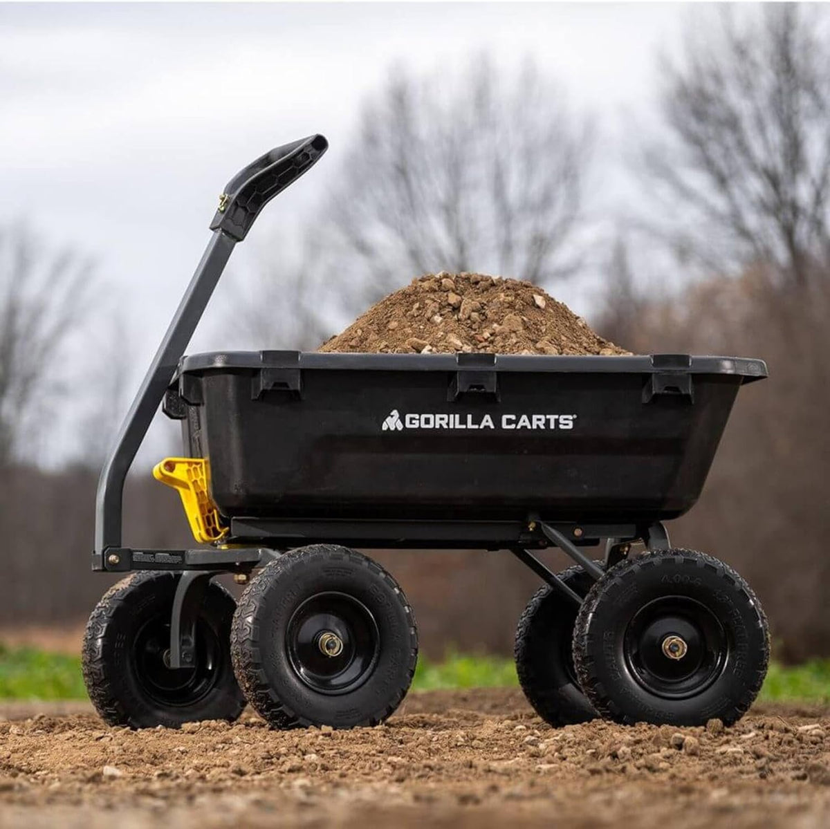 Poly Dump Garden Cart With No-Flat Tires And Serrated Shovel, 7 Cubic Feet, 1,200 lb Capacity, Black