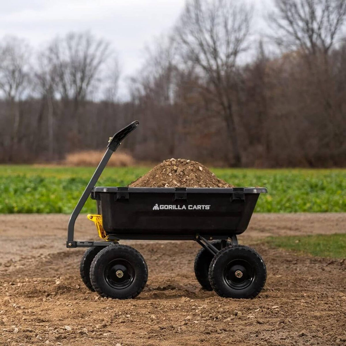Poly Dump Garden Cart With No-Flat Tires And Serrated Shovel, 7 Cubic Feet, 1,200 lb Capacity, Black
