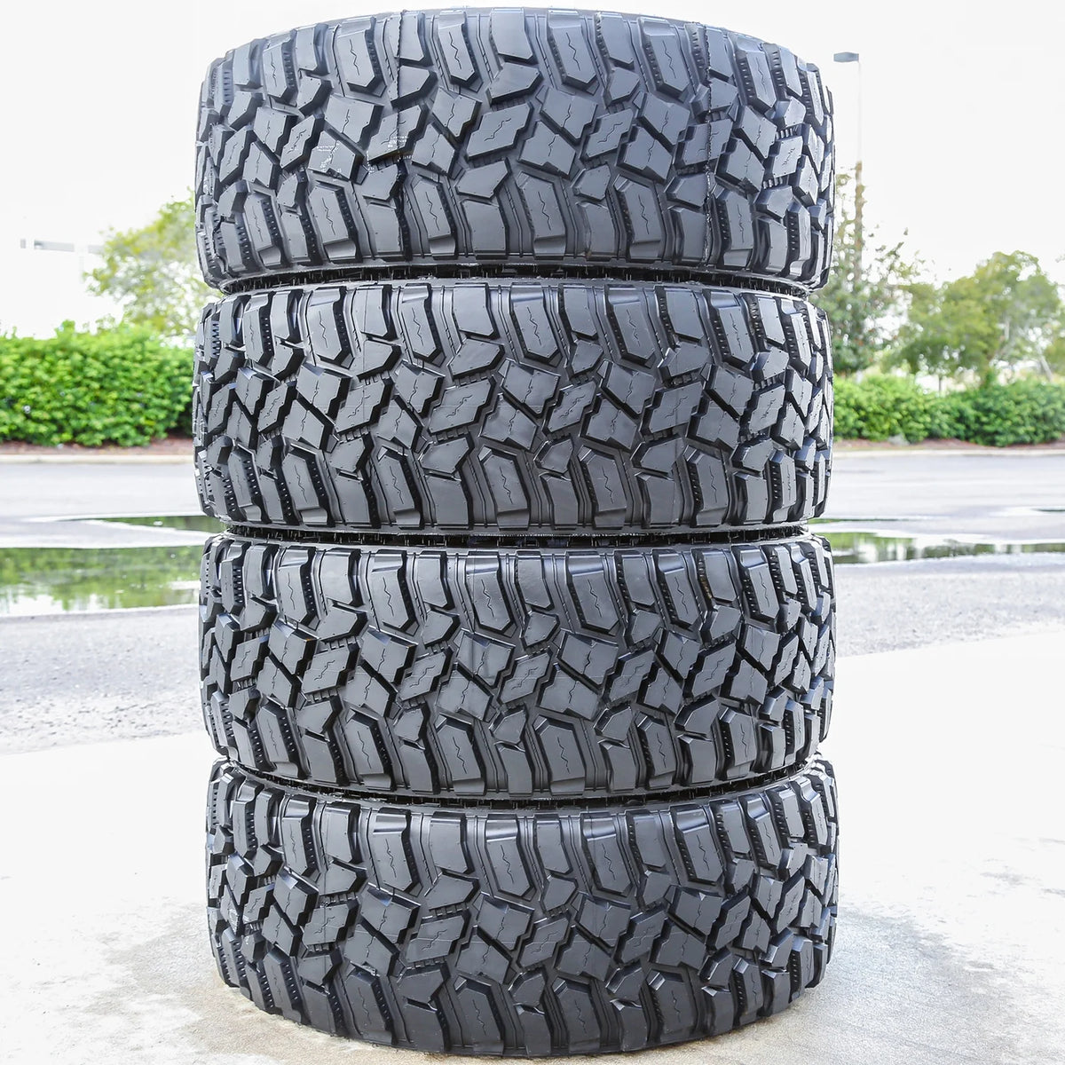 Cooper Discoverer STT Pro Mud Terrain Light Truck Tires 285/75R16 126/123Q E 10 Ply - Set Of 4